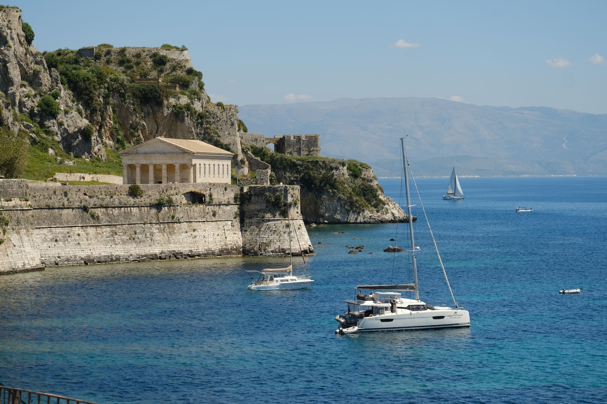 corfu old fortress and sailing boats photographed by vlad lov